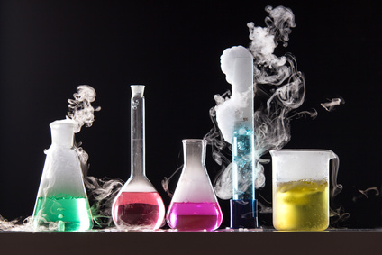 Glass in a chemical laboratory filled with colored liquid during