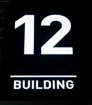 Building number 12. Numberplate